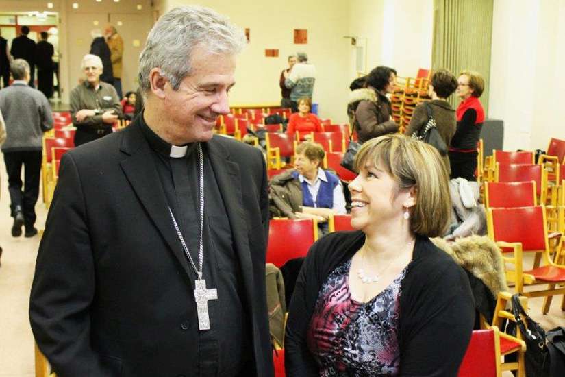 Aid to the Church in Need spokesperson Marie Claude Lalonde, right, speaks with Montreal Archbishop Christian Lepine. Lalonde says that in 60 per cent of countries around the world, religious liberty is compromised.
