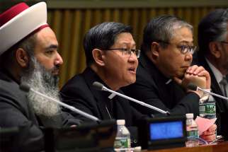 Cardinal Luis Antonio Tagle of Manila, Philippines, speaks during an interfaith conference on migrants and refugees at the U.N. headquarters in New York May 3. The event was co-hosted by the Permanent Mission of the Holy See to the U.N. and Caritas Internationalis. 