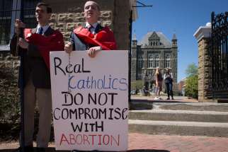 Pro-life demonstrators gather outside the campus of Georgetown University in Washington April 20.