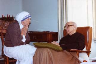 St. Teresa of Kolkata is pictured in 1982 with Jesuit Father Pedro Arrupe in Rome. The sainthood cause for Father Arrupe was formally opened in Rome at the Basilica of St. John Lateran Feb. 5, 2019, the 28th anniversary of his death. He was superior general of the Jesuits from 1965 to 1983. 