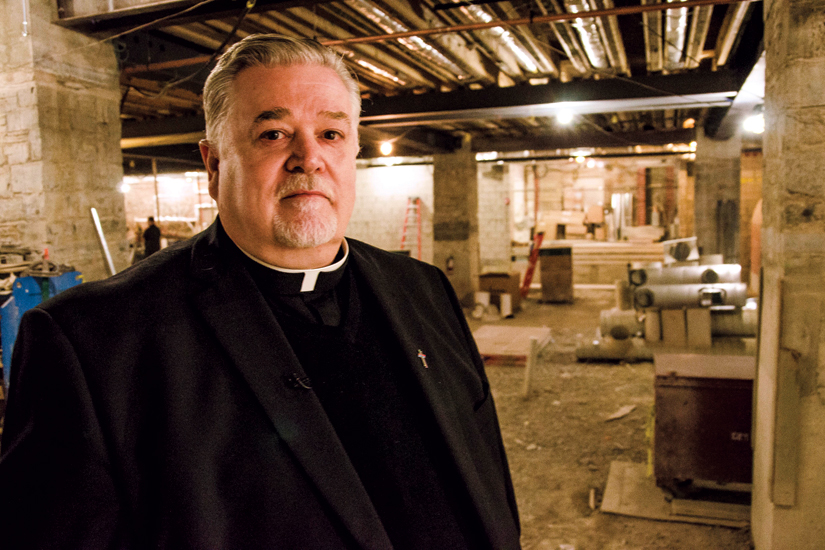 Fr. Michael Busch directed the renovation project. (Photo by Evan Boudreau)