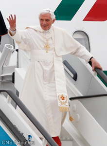 Pope Benedict XVI waves as he arrives at Madrid's Barajas airport Aug. 18. The pope arrived in Spain's capital to spend four days with hundreds of thousands of World Youth Day pilgrims.