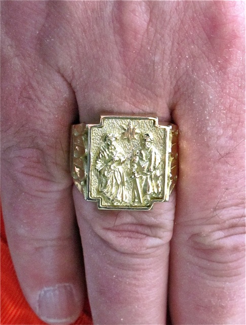 Here's the gold ring Cardinal Thomas Collins received from Pope Benedict.