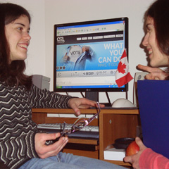 Youth Speak News writers Annette Gagliano, left, and her sister Sarah, check out “It’s Your Vote,” a web site which gives youth all the information they need to make an informed decision on May 2.  (Photo courtesy of Annette and Sarah Gagliano)