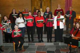 The Christ the King Choir prepares for its multicultural and intergenerational Advent concert.