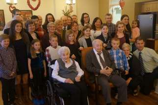 The Evoy’s extended family pose for a group photograph after Margaret and Nelson Evoy received Worldwide Marriage Encounter’s Longest Married Couple in Canada Award Feb. 12 in Ottawa. The Evoys have been married 78 years.