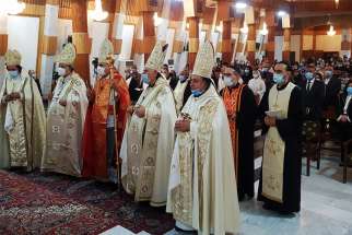 Syriac Catholic Patriarch Ignace Joseph III Younan celebrated Mass at Our Lady of Deliverance Cathedral in Baghdad Oct. 31, 2020, commemorating the 10th anniversary of the massacre at the church. Two priests were among the 48 people killed during the Oct. 31, 2010, attack.