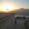 An international group of students observe the transit of Venus at sunrise from the roof of the papal summer villa in Castel Gandolfo, Italy, June 6. The students attending a Vatican Observatory summer school watched the rare occurrence of the planet Venus crossing the face of the sun.