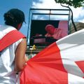 A Canadian pilgrim watches Pope John Paul II on a television monitor during World Youth Day 2002 in Toronto. Many Canadians will be watching Pope Francis on TV at home during WYD in Brazil this July. Canadian WYD attendance has drastically decreased.