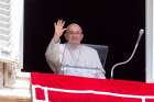 Pope Francis greets visitors gathered in St. Peter&#039;s Square at the Vatican to pray the Angelus Aug. 18, 2024.