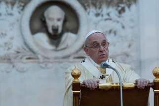 Pope Francis gives the homily as he celebrates Mass at the Verano cemetery in Rome Nov. 1, the feast of All Saints.