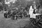 Chaplain John W. Forth presiding at a service for the Cameron Highlanders of Ottawa near Caen, France, in July 1944.