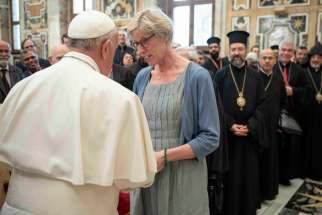 Pope Francis greets Astrid Kaptijn, a professor of canon law and president of the Society for the Law of the Eastern Churches, Sept. 19, 2019, during an audience in the Clementine Hall of the Apostolic Palace at the Vatican.
