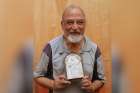 Father Cosme Jose Costa displays an icon of Blessed Joseph Vaz in late October at the Society of Pilar headquarters in Pilar, India. Father Costa&#039;s 1938 birth was accepted by the Vatican as the miracle needed to beatify Blessed Vaz in 1995. Blessed Vaz w ill be canonized by Pope Francis Jan. 14 at the Vatican in Sri Lanka.