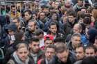 Refugee job seekers gather at a job fair in Berlin, Feb. 29, 2016. A recent report that tracks Christians who have fled to Europe from Iraq and Syria estimates that between 50 and 80 per cent of Christians from those two countries have fled since the start of the Syrian Civil War in 2011.