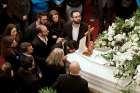 Friends and relatives of Elias Wardini, a Lebanese man killed in a gun attack on the Reina nightclub in Istanbul, mourn during his Jan. 3 funeral Mass at the Church of Our Lady in Beirut. At least 39 people were killed and dozens wounded in the New Year&#039;s Eve attack on the nightclub.