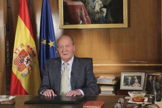 A pool picture released by the Spanish Royal Household June 2 shows Spain’s King Juan Carlos delivering a speech to explain the reasons for his abdication on a TV broadcast after the abdication was announced by Spanish Prime Minister Mariano Rajoy.