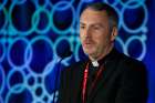 Msgr. John Kennedy, head of the disciplinary action section at the Congregation for the Doctrine of the Faith, gives a talk at the Catholic Media Conference in St. Petersburg, Fla., June 19, 2019. Msgr. Kennedy related his experiences handling clerical sexual abuse cases, and their effect on the church as well as him personally.