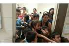 This handout photo courtesy of the office of U.S. Rep. Henry Cuellar, D-Texas, shows unaccompanied migrant children at a Department of Health and Human Services facility in south Texas. Many undocumented minors coming across the U.S. border claim they ar e escaping gang violence in their home countries.