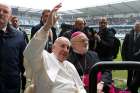 Pope Francis and Bishop Anders Arborelius of Stockholm ride in a golf cart as the pope greets the crowd before celebrating Mass in Malmo, Sweden, in this Nov. 1, 2016, file photo. Bishop Arborelius is among five new cardinals who will be created by the pope at a June 28 consistory.