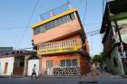 A man walks next to an earthquake-damaged building in Juchitan, Mexico, Sept. 9. 