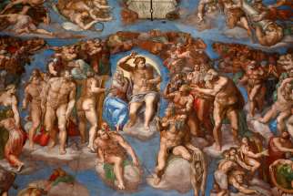 “The Last Judgment” by Michelangelo is pictured in the Sistine Chapel in the Vatican Museum.