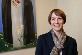 Natasa Govekar, director of the theological-pastoral department of the Vatican&#039;s Secretariat for Communication, is pictured in her office at the Vatican March 21. Govekar said church communications involves creativity. &quot;You can never just cut and paste from the past and, even less, from the world.&quot;