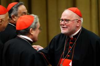 Cardinal Reinhard Marx of Munich-Freising, president of the German bishops&#039; conference, arrives for a session of the Synod of Bishops on the family at the Vatican Oct. 23, 2015.