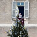 The Christmas tree in St. Peter&#039;s Square is seen as Pope Francis greets the crowd gathered for the Angelus at the Vatican Dec. 15.