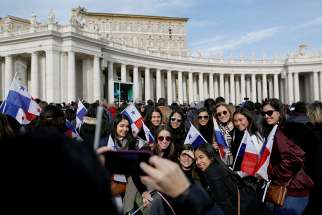 Students from Panama pose for a photo as Pope Francis leads the Angelus Jan. 22 in St. Peter&#039;s Square at the Vatican. 