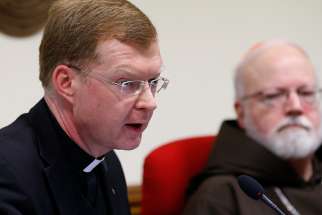 Jesuit Father Hans Zollner, president of the Center for Child Protection, speaks in 2015 at the Pontifical Gregorian University in Rome during a news conference officially launching the Center for Child Protection in Rome.