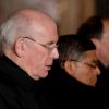 Cardinal Sean Brady of Armagh, Northern Ireland, left, attends a Feb. 7 penitential vigil at St. Ignatius Church in Rome to show contrition for clerical sexual abuse. On March 20, the Vatican released an eight-page summary of the findings and recommendations of the visitation to four archdioceses, religious institutes and seminaries in Ireland.