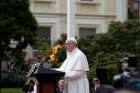 Pope Francis addresses the audience during a meeting with Colombian President Juan Manuel Santos and other government authorities in the courtyard of the presidential palace in Bogota, Colombia, Sept. 7. 