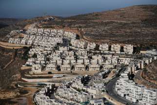 The construction of the Israeli settlement of Ramat Givat Zeev is seen Nov. 19, 2019, in the occupied West Bank. The Vatican reiterated its call for a two-state solution in the Holy Land after U.S. Secretary of State Mike Pompeo announced that the United States would no longer recognize the illegality of Israeli settlements in the West Bank.
