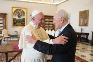 Pope Francis welcomes former Israeli President Shimon Peres in this photo dated 2012.