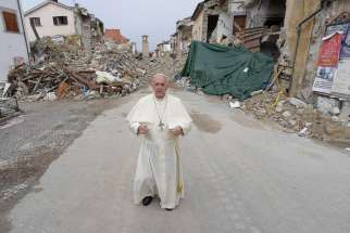 Pope Francis walks in the earthquake-ravaged town of Amatrice, Italy, Oct. 4. The town was devastated by an Aug. 24 earthquake that claimed the lives of nearly 300.