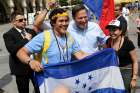 Panamanian President Juan Carlos Varela poses with pilgrims at the 2016 World Youth Day in Krakow, Poland. Cardinal Kevin J. Farrell says he hopes the January start date for the 2019 WYD in Panama won&#039;t keep students from attending.