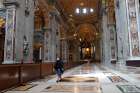 A nun walks in St. Peter&#039;s Basilica at the Vatican May 18, 2020, after the basilica reopened to the public during the COVID-19 pandemic.