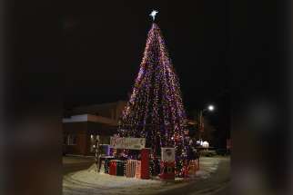 Thomas Shura donated a 33-foot spruce tree for display on Kenora, Ont.’s Main Street.
