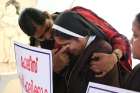 A woman religious is consoled during a Sept. 13 protest in Cochin, India, demanding justice after a nun accused Bishop Franco Bishop Franco Mulakkal of Jalandhar of raping her. 