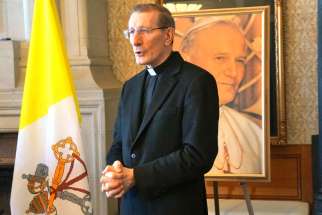 Papal nuncio,Archbishop Luigi Bonazzi invokes the intercession of St. John Paul II as he gave a blessing to the Parliament Hill gathering marking the first Pope John Paul II Day. 