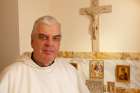 Dominican Father Wojciech Giertych, theologian of the papal household, is pictured in the chapel at his residence in the Apostolic Palace in 2013.