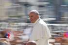 Pope Francis arrives for his general audience in St. Peter&#039;s Square May 17 at the Vatican.