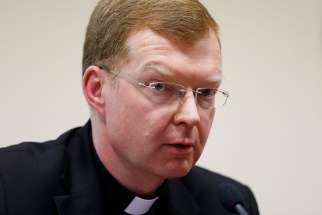 Jesuit Father Hans Zollner, a psychologist and academic vice rector at the Pontifical Gregorian University in Rome, attends a news conference at the university in this Feb. 16, 2015, file photo.