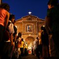 Filipinos attend midnight Mass outside St. Joseph Church in Las Pinas City of Manila&#039;s metropolitan region.