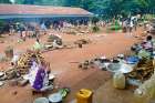 Displaced people are seen on the grounds of a seminary Aug. 9 in Bangassou, Central African Republic. Catholic priests whose villages have been attacked have taken to Facebook to express outrage and appeal for help.