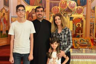 Fr. Issa Maamar and his family —  wife Rima Chahin and children Jean Pierre, 14, and Anna Marie, 6 — were forced to flee Syria in 2016 and have settled in Edmonton where Maamar leads the Greek-Melkite Church.