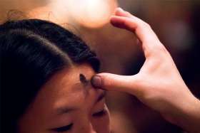 A cross is marked on the forehead during Ash Wednesday, which marks the start of the Lenten season. The ashes symbolize both our mortality and the need for penance.