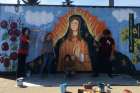 James Cote, Hannah Oryschak, Emma Wang and Jude Dias painted an image of Our Lady of Guadalupe on a Sea-Can bound for Fort Good Hope, N.W.T. 