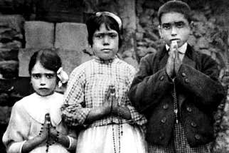 Portuguese shepherd children Lucia dos Santos, centre, and her cousins, Jacinta, left, and Francisco Marto, seen in a file photo taken around the time of the 1917 apparitions of Mary at Fatima. Pope Francis will formally approve the canonization of Jacinta and Francisco April 20. 